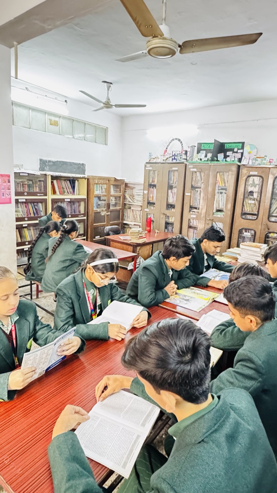 Students reading in the library — Jyoti Model Sr. Secondary School