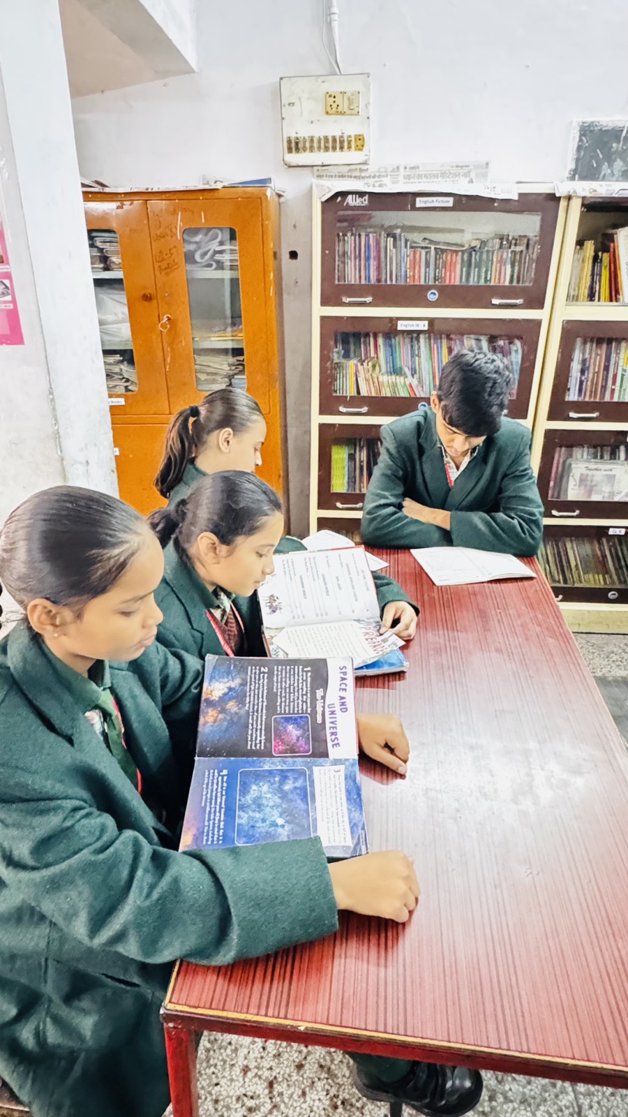 Students reading in the library — Jyoti Model Sr. Secondary School