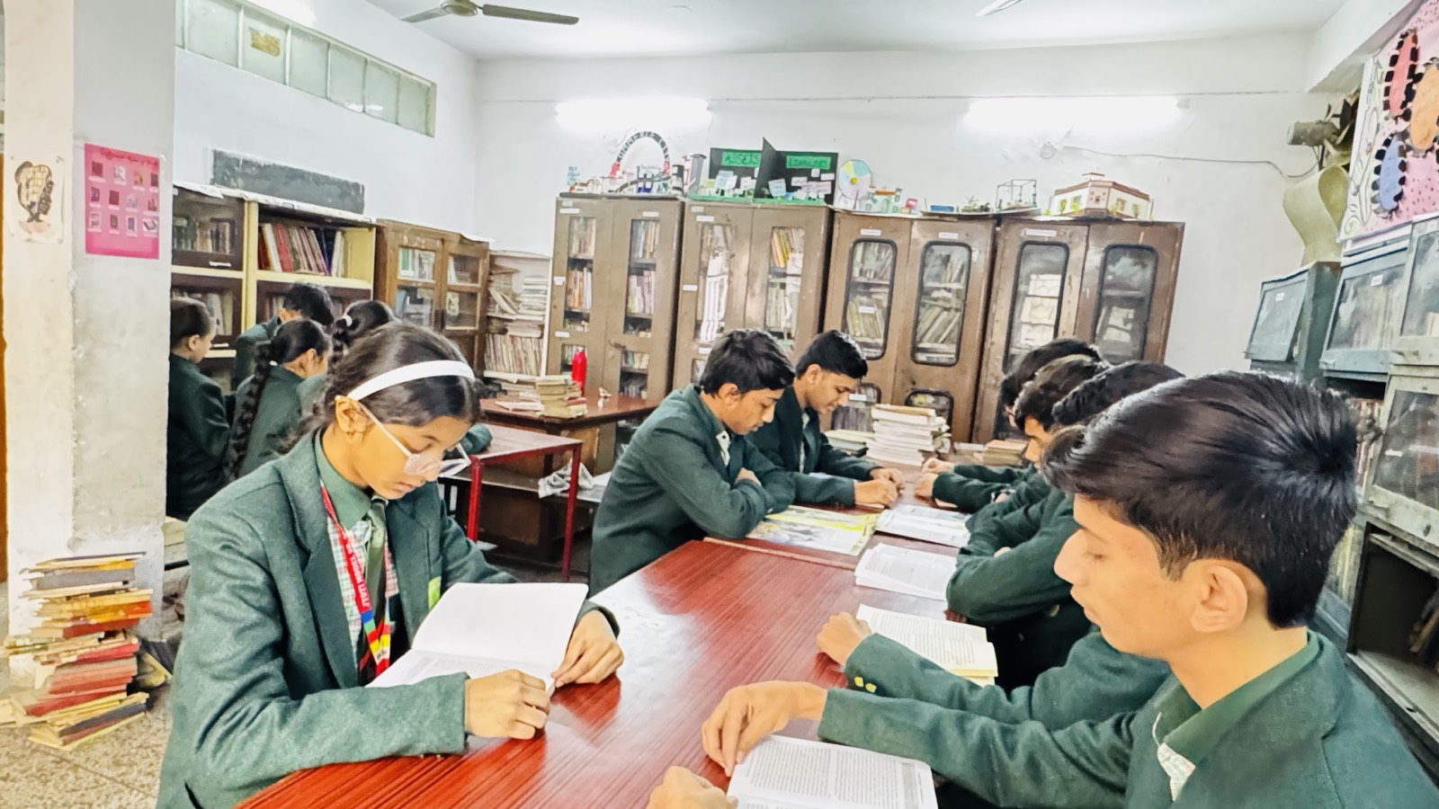 Students reading in the library — Jyoti Model Sr. Secondary School