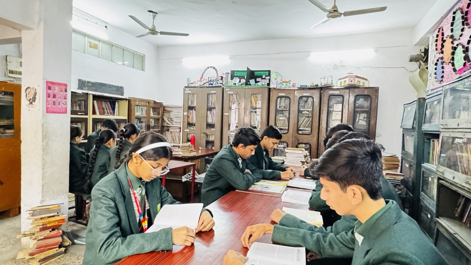 Students reading in the library — Jyoti Model Sr. Secondary School