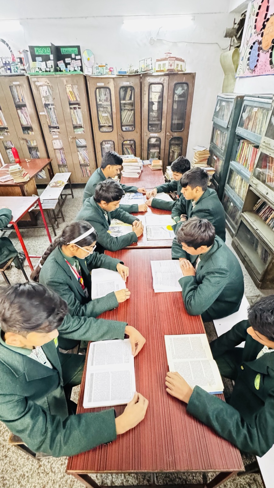 Students reading in the library — Jyoti Model Sr. Secondary School
