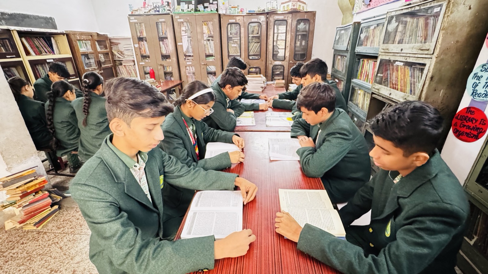 Students reading in the library — Jyoti Model Sr. Secondary School